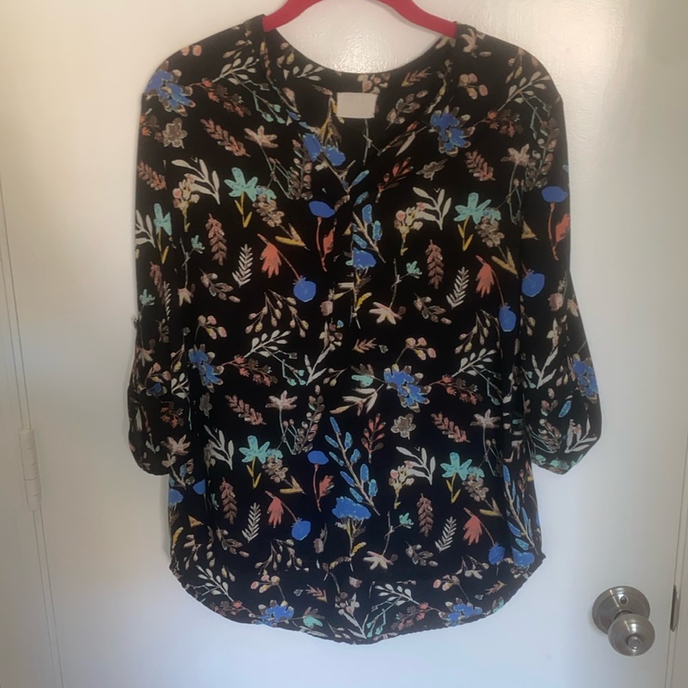 Black top with beautiful multicolor floral pattern